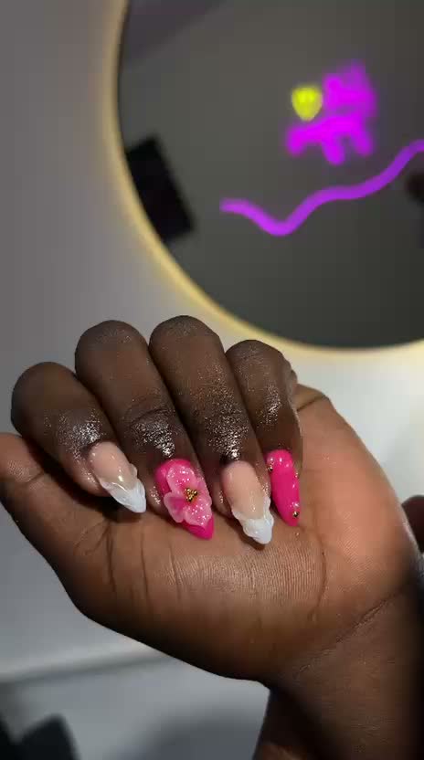 Almond nails with pink tips and 3D floral art
