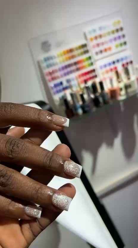 Square nails glittery base with white French tips
